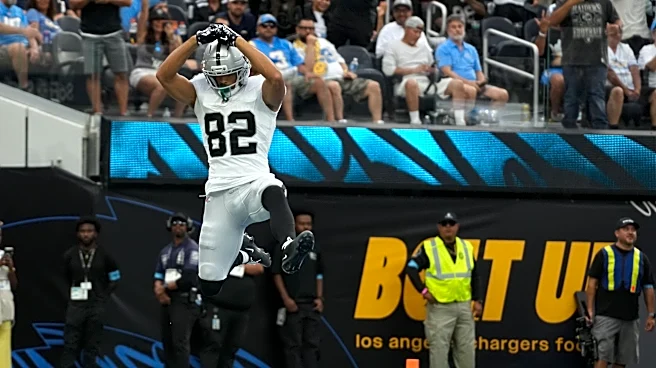 Former Spartans connect for pair of TDs in Raiders win vs. Harbaugh, Chargers