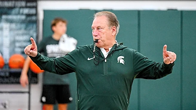 Tom Izzo speaks to the media following the first day of practice
