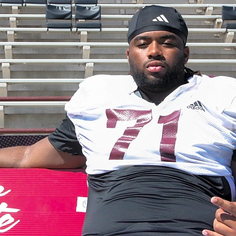 King Large thriving with Missouri State football, with supportive family nearby