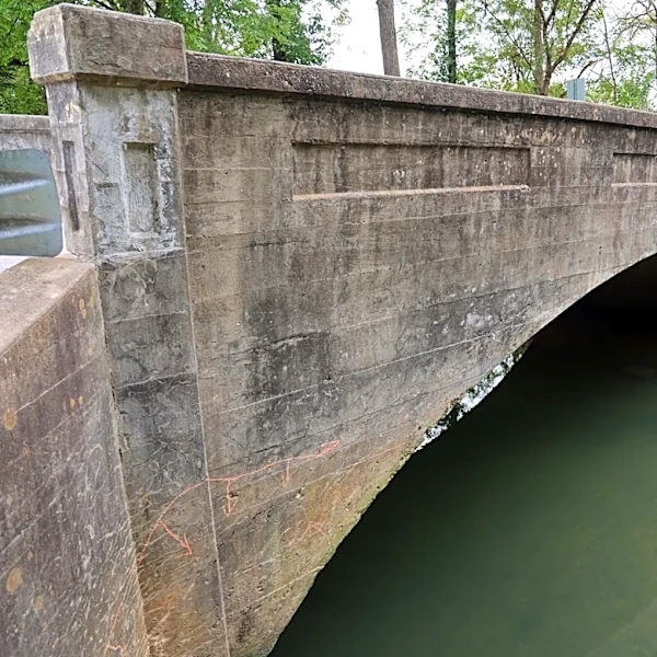 Sac River Arch Bridge with few early records becomes historic site