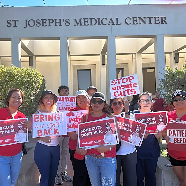 St. Joseph’s Medical Center nurses protest layoffs of support staff
