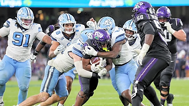 Helmet stickers from UNC's season-opening football upset of TCU