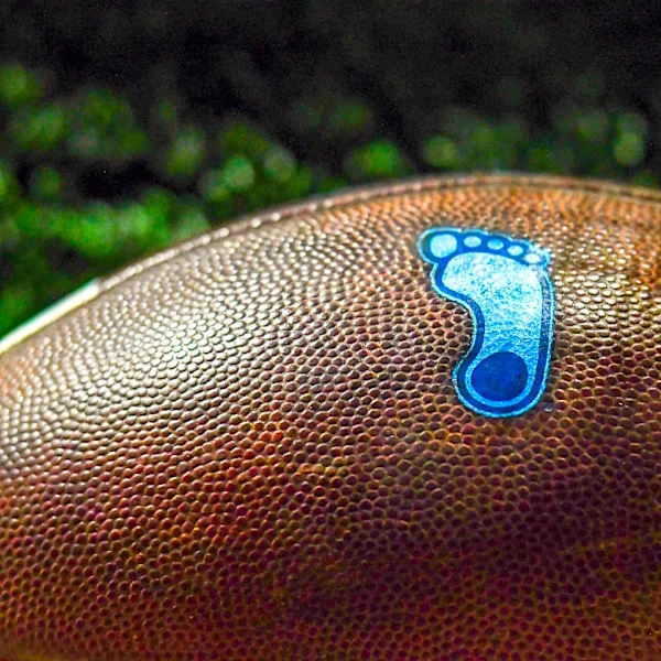 UNC football to use throwback logo at midfield
