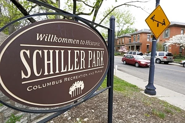 Vehicle drives through Schiller Park, hits historical marker