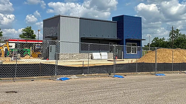 What's that moving in next door to the LA Fitness in Arlington?