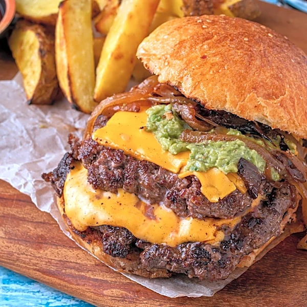 The Hands Down Best Time To Smash Burgers On The Grill