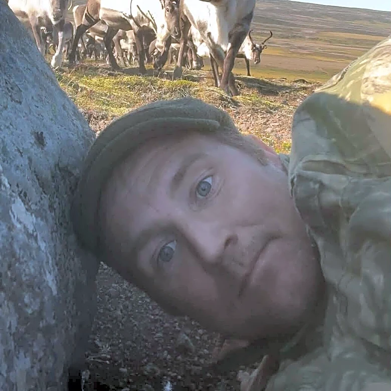 Photographer Hides Behind A Rock As 400 Wild Reindeer Come Running Toward Him