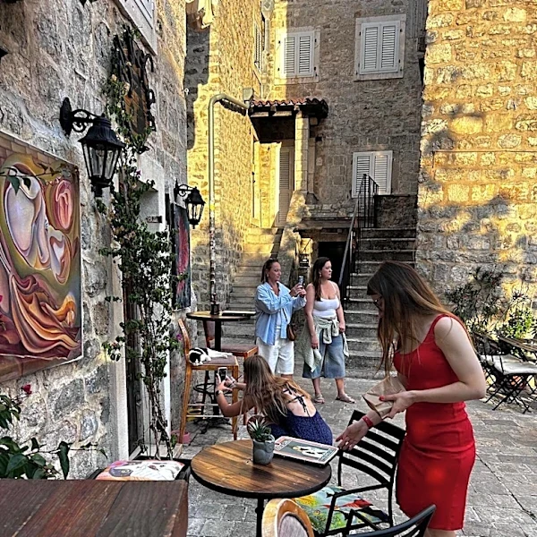 Travelers Spot A Cat Beside A Strange Sign And Decide To Follow Her