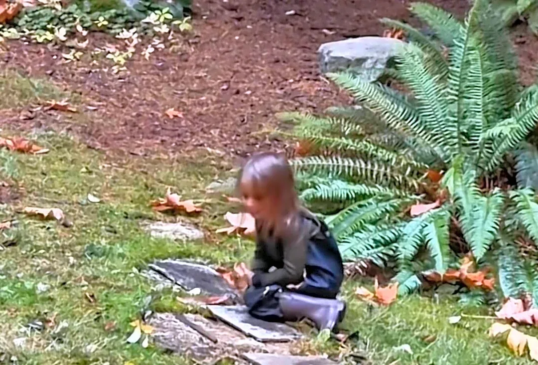 Parents Hear Their Daughter Talking In Yard — Then Realize She's Made A Slimy Friend