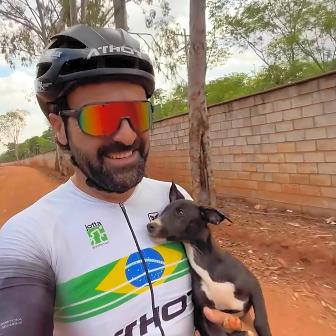 Puppy Stranded Alone On Roadside Shows His Belly To Cyclist Who Stops To Help