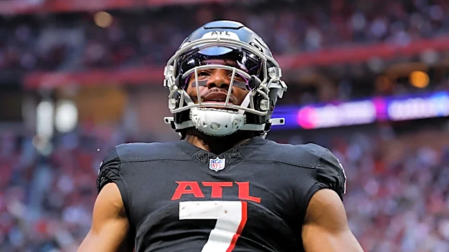 Bijan Robinson not practicing over 'contract-related' issue