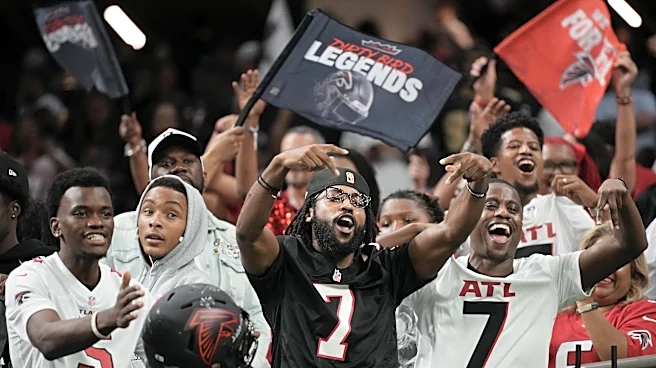 Falcons locker room celebrates blowout win over rival Saints