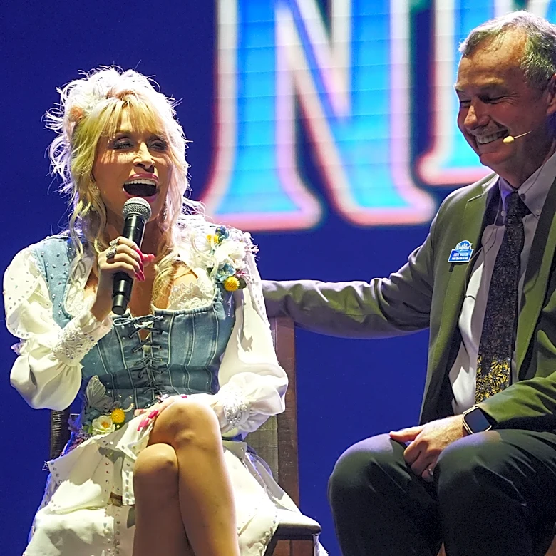 Dolly Parton won’t be at Dollywood to celebrate the park’s newest ride