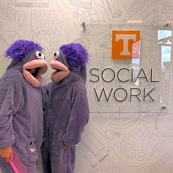 Why are there fuzzy purple monsters at the UT College of Social Work?