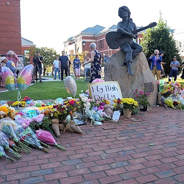 Flowers left at Dolly Parton statue will help hospital patients
