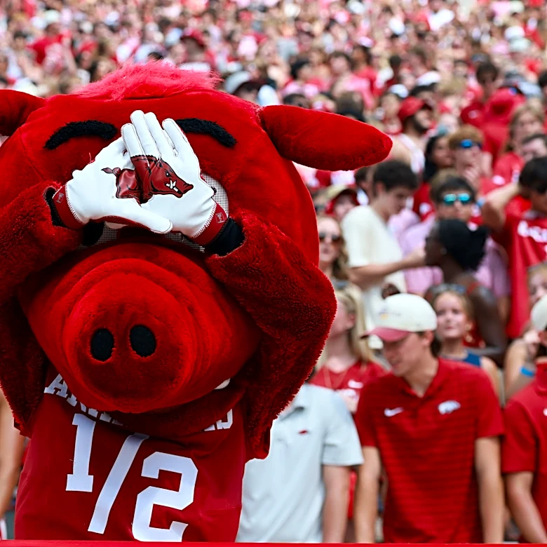 100 simulations of Tennessee football vs. Arkansas predict roasted hog