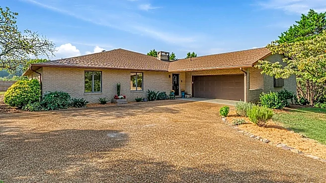 This house for sale in Halls is brick ranch in front, pool party inside