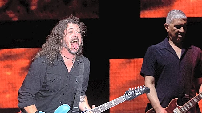 Dave Grohl performs with star guests at charity gala
