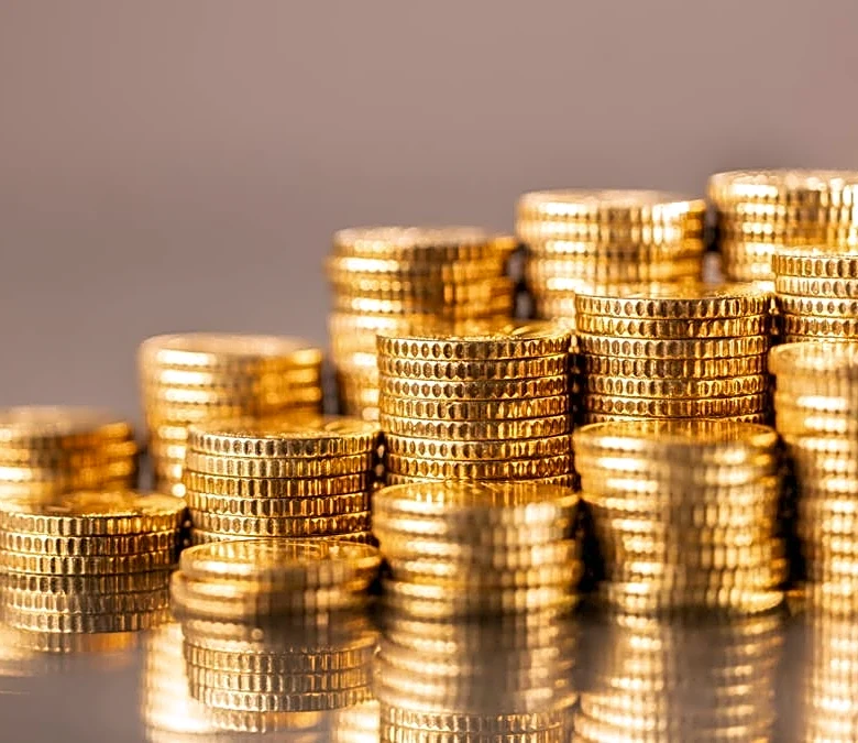 JPMorgan tweaks gold price target as Fed risks return