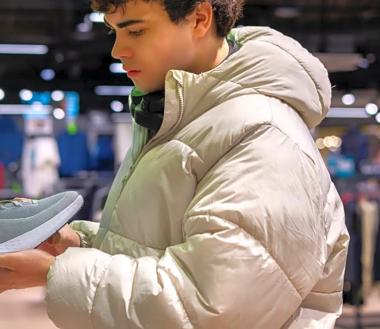 Sportswear giant closes 113 stores as shares plunge