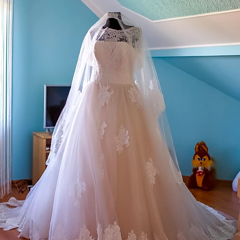 Engaged Couple Discovers Vintage Wedding Dress in New Home's Attic