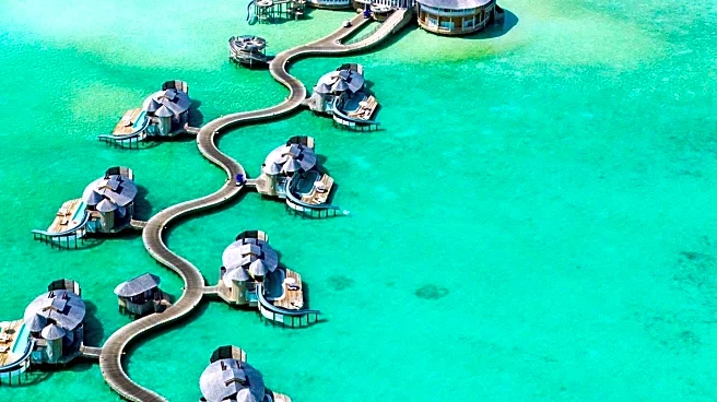 Elizabeth Hurley Showcases Bikini Styles During Maldives Vacation