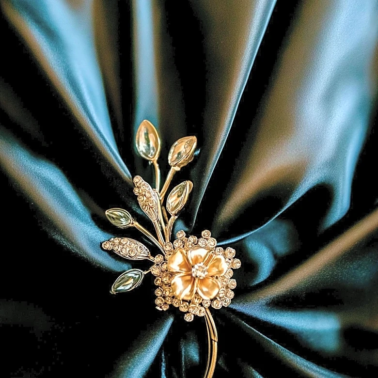 Queen Camilla Showcases Van Cleef  Arpels Brooch at Library Opening