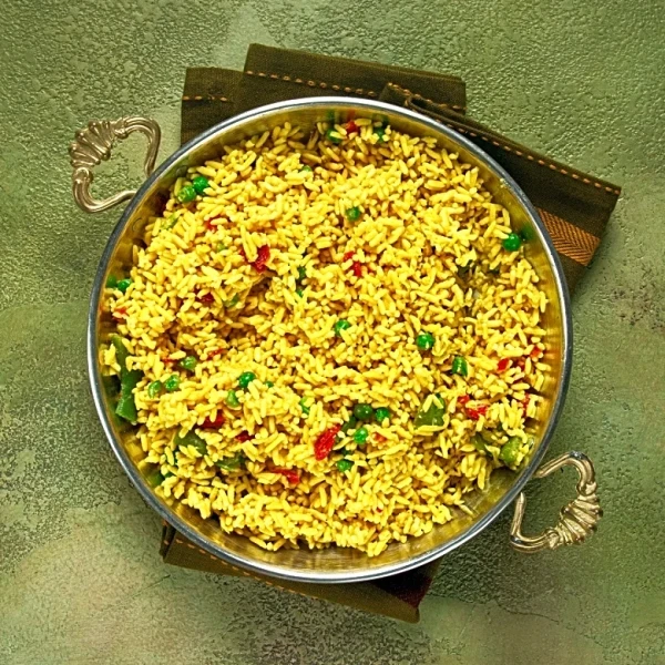 Chef Mia Castro Showcases Puerto Rican Cuisine with Pigeon Pea and Rice Stew