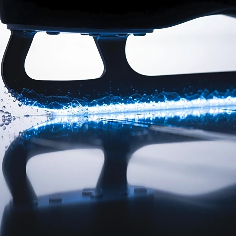 The Complex Science Behind Ice Skating: Pressure, Friction, and Molecular Layers