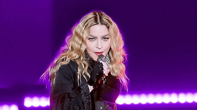 Madonna Captivates Audience at Dolce  Gabbana's Milan Fashion Week Show