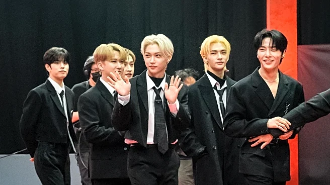 Stray Kids' I.N Highlights Red Sneakers as Fashion Statement in Milan