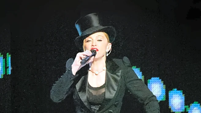 Madonna Showcases Prada Monolith Lug Boots at Milan Fashion Week