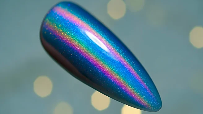 Taylor Swift's Opalescent Cat-Eye Nails Steal the Show at iHeart Radio Awards