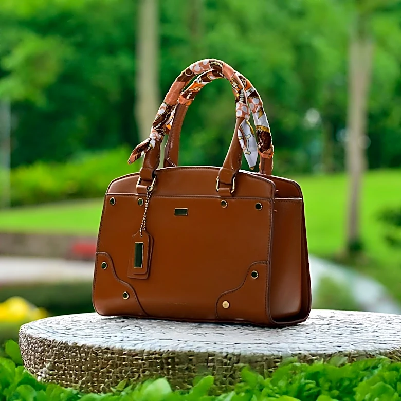 Enfin Levé Introduces T Rex Leather Handbag, Merging Ancient Biology with Modern Design