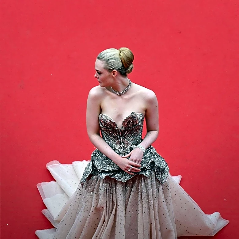 Elle Fanning's Red Carpet Beauty Secrets: Achieving the Perfect Red Lip