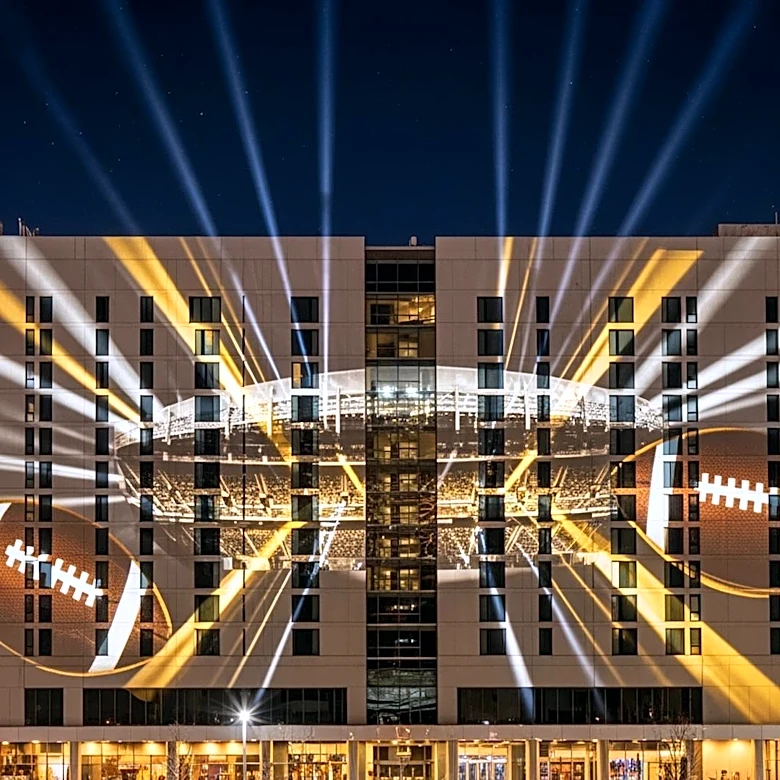 Pittsburgh Hotel Light Projection Celebrates City's Football Legacy During NFL Draft