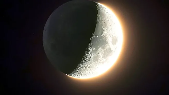 Photographer Captures Unique View of First Quarter Moon with Earthshine