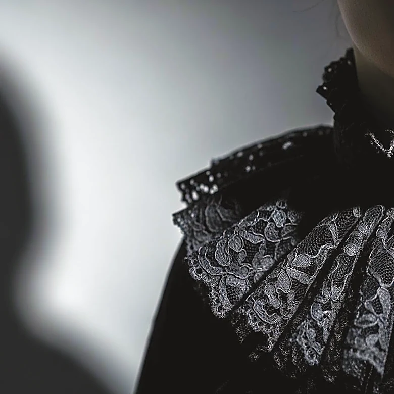 Janelle Monáe Stuns in Gothic-Inspired Ruff Collar at 'Is God Is' Premiere