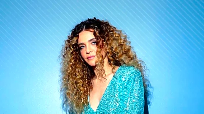 Bella Hadid Showcases Boho Summer Curls at Los Angeles Event