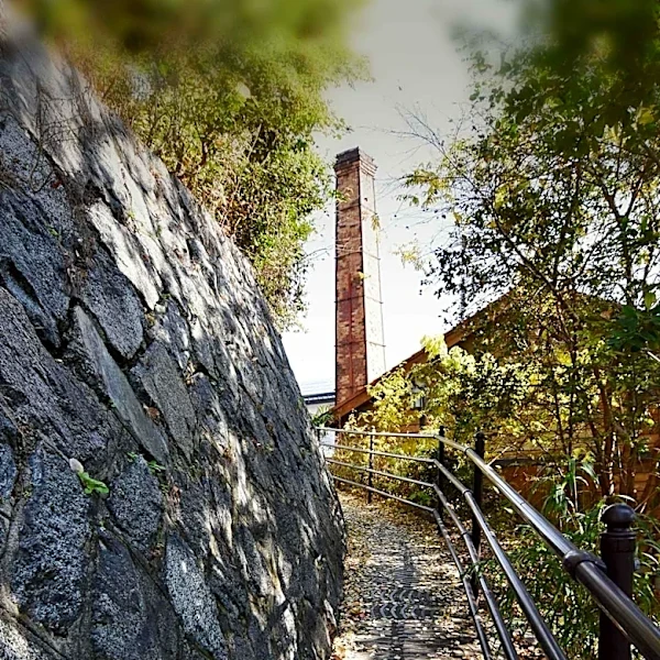 Williamsburg Loft Features Unique 70-Foot Smokestack in Private Garden