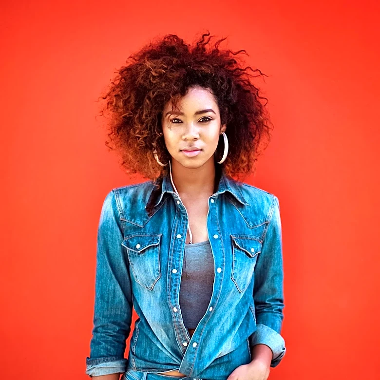 WNBA's Kaila Charles Embraces Natural Hair, Inspires Confidence Among Fans