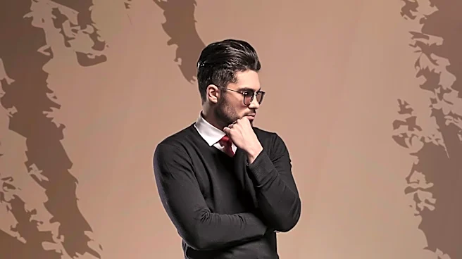 Ernest W. Baker Showcases Spring 2027 Menswear Collection with Cinematic Flair