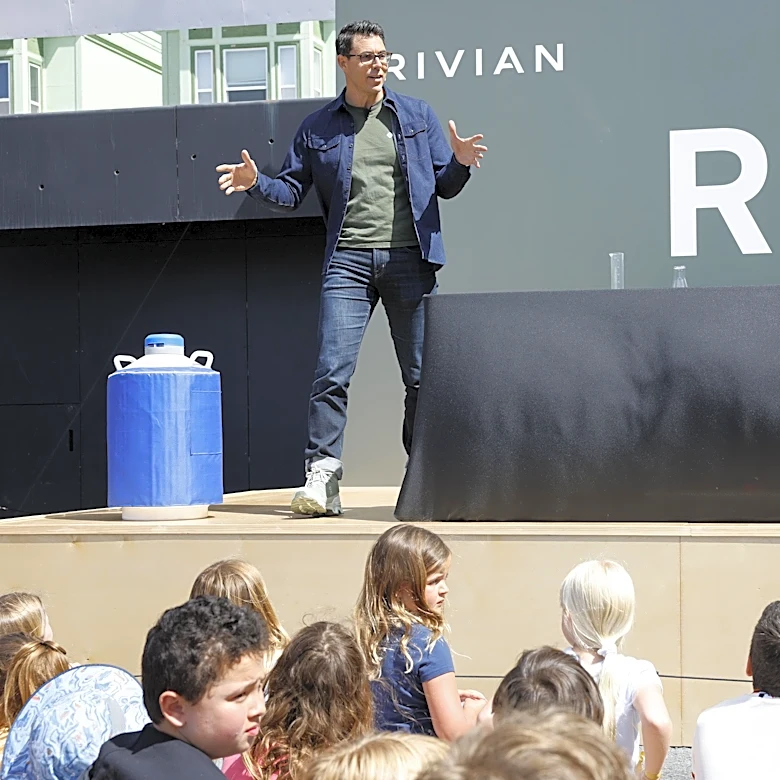 Rivian CEO Warns Carmakers: Invest in EVs or Fall Behind
