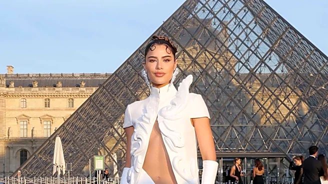 North West Steps Out with Face Piercings and Spiked Collar at Paris Fashion Week
