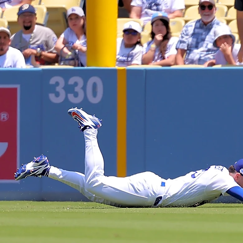 Reds' Dane Myers Injured After Collision with Outfield Fence