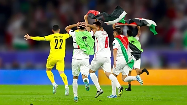 Egypt Coach Hossam Hassan Waves Palestinian Flag After World Cup Victory
