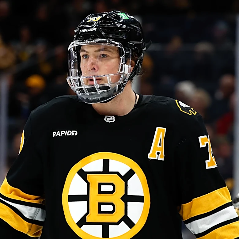 Gerry Cheevers' Unconventional Coaching Debut in Goalie Gear for Boston Bruins