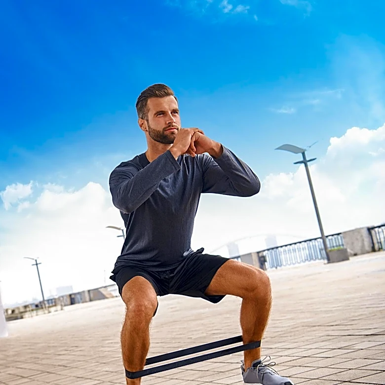 Trainer Introduces Resistance Band Exercises to Enhance Leg Workouts