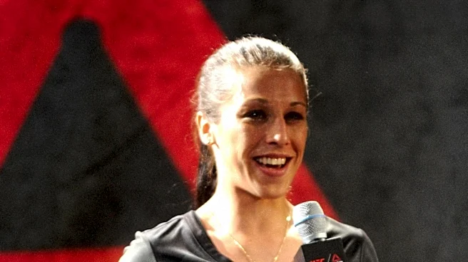 WNBA's Sophie Cunningham Participates as Ring Girl at UFC 329 Event