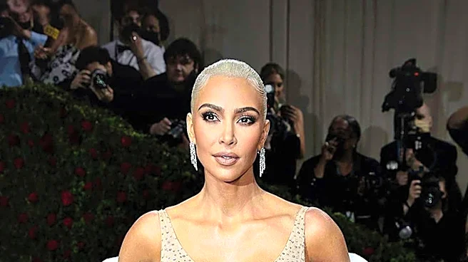 Kim Kardashian Faces Criticism Over Bikini Photos Amid Family Grief